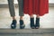 Couples foots stay at the street, stylish trendy outfit. The most beautiful pair of shoes. Legs of a young couple in shoes