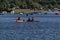 Couples kayaking on lake