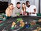 Couples play game slot car racing track