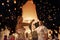 Couples releasing lanterns in the sky during Yi Peng festival, Thailand