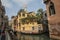 Couples take a ride on a gondola that is navigating on one of the many smaller canals of Venice