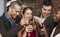 Couples Toasting Drinks At Bar