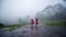 Couples tourist with rain coat walking travel adventure nature in the rain forest. travel nature, Travel relax, Travel Thailand,