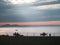 Couples watching the sea at the sunset in park