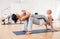 Couples yoga classes in modern fitness center