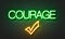 Courage neon sign on brick wall background.