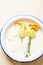 Courgette flowers stuffed with ricotta and coated in flour batter