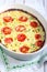 Courgette, peas, cheese and tomato frittata