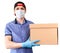 Courier with cardboard box from delivery service, man with medical mask and blue neoprene gloves, isolated on white background