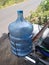 Courier gallons of mineral water