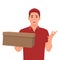 Courier with the parcel. A delivery man in red uniform holds a cardboard box in his hands