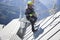 COURMAYEUR, ITALY - JULY 29, 2016:Young alpinist practicing before cllimbing the Mount Blanc