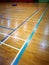 Court line markings on multi function sports hall floor