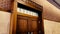 courtroom door and seating benches dark color grade slow motion