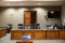 Courtroom interior with offices of the judge of the clerks and the public ministry in