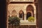Courtyard of Alcazar, example of Mudejar architecture of the 14th century, royal palace with patterned arches, Seville