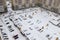 The courtyard apartment building in the winter. In the yard Parking, Playground and cars