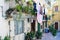 Courtyard with balcony, plants and laundry in Taormina at Sicilian Island