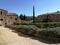 Courtyard of the cloister of Sant`Antimo abbey in Tuscany, Italy.