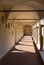 Courtyard with decorated columns, arches and green lawn of old Franciscan friars cloister near the Dante`s Tomb and Basilica of S