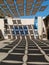 Courtyard decorated with shadows, in a square in the neighborhood of Miraflores, in front of the Museum of Visual Arts (MAVI), on