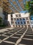 Courtyard decorated with shadows, in a square in the neighborhood of Miraflores, in front of the Museum of Visual Arts MAVI, on