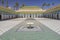 Courtyard at El Bahia Palace, Marrakech, Morocco. In the middle are small white fountains