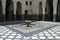 Courtyard with fountain and zellige tiled floor at Dar Si Said