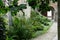 Courtyard garden at 15th century Jerusalem Church Jeruzalemkerk, Bruges / Brugge, Belgium.