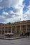 The Courtyard of Honor at the Palais-Royal in Paris, France with people