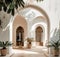 Courtyard With Potted Plants and Arched Doorways