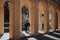 Courtyard in the Prince`s Garden in Alcazar of Seville, Spain, people inside