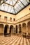 Courtyard with skylight and marble columns at Gomez-Tortosa Center