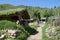 A courtyard surrounded by mountains and green plants,Shanxi, China