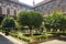 Courtyard with trees and a fountain in the Doria Pamphili Gallery
