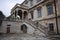 Courtyard view, stairs and old stone walls of ancient castle in village of Pidhirtsi