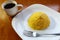 Couscous corn. Brazilian breakfast with coffee cup