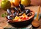 Couscous with mussels in earthenware bowl