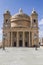 Coutyard and facade of St. Mary`s church at Mgarr on Malta.