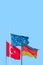 Cover page with national black red yellow flag of Germany, blue with stars EU and red Turkish flag with white crescent moon and