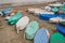 Covered boats on a beach