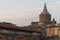 Covered bridge and Pavia cathedral in Pavia at sunset