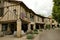 Covered passage around the central square of the village of Fourcès