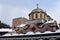 Covered by snow dome of Rila Monastery, Bulgaria