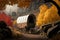 covered wagon on scenic mountain trail, surrounded by autumn colors