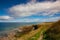 Covesea Skerries Lighthouse on the empty beach