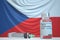 COVID-19 coronavirus disease vaccine vial and syringe against the Czech flag. Medical research and vaccination in Czech