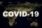 COVID-19 coronavirus pandemic, name COVID-19 on global map. SARS-CoV-2 coronavirus outbreak in world. Rapid spread of deadly