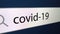 Covid-19 at the end a question mark is written in the search bar with a cursor