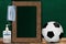 COVID-19 New Normal Soccer Sports Concept With Frame Chalkboard and Copy Space